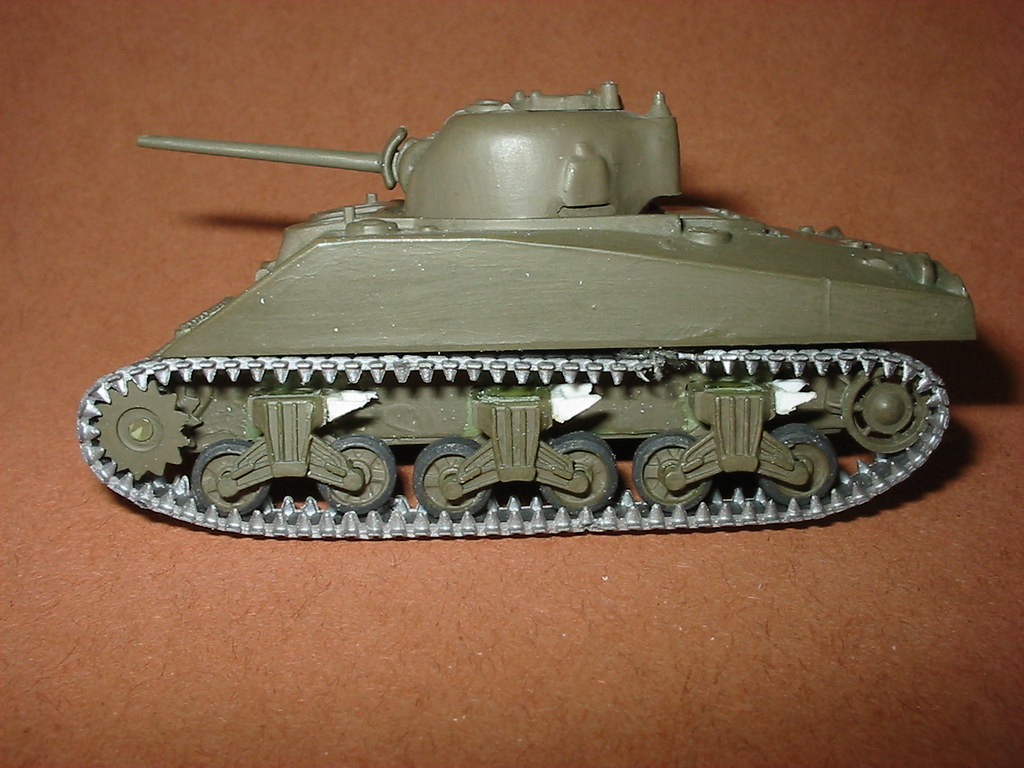 Airfix M4 Sherman Medium tank, with improved brackets for the rack return rollers aft of the suspension pieces...