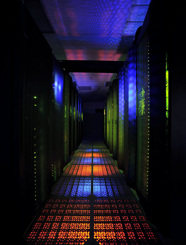 Two rows of the “Discover” supercomputer at the NASA Center for Climate Simulation (NCCS) contain more than 4,000 computer processors. Original from NASA. Digitally enhanced by rawpixel.