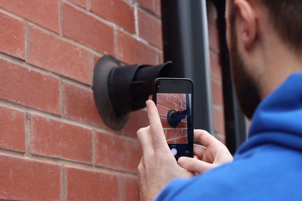 Vertical boiler flue on external wall (Creative commons by https://heatable.co.uk/)