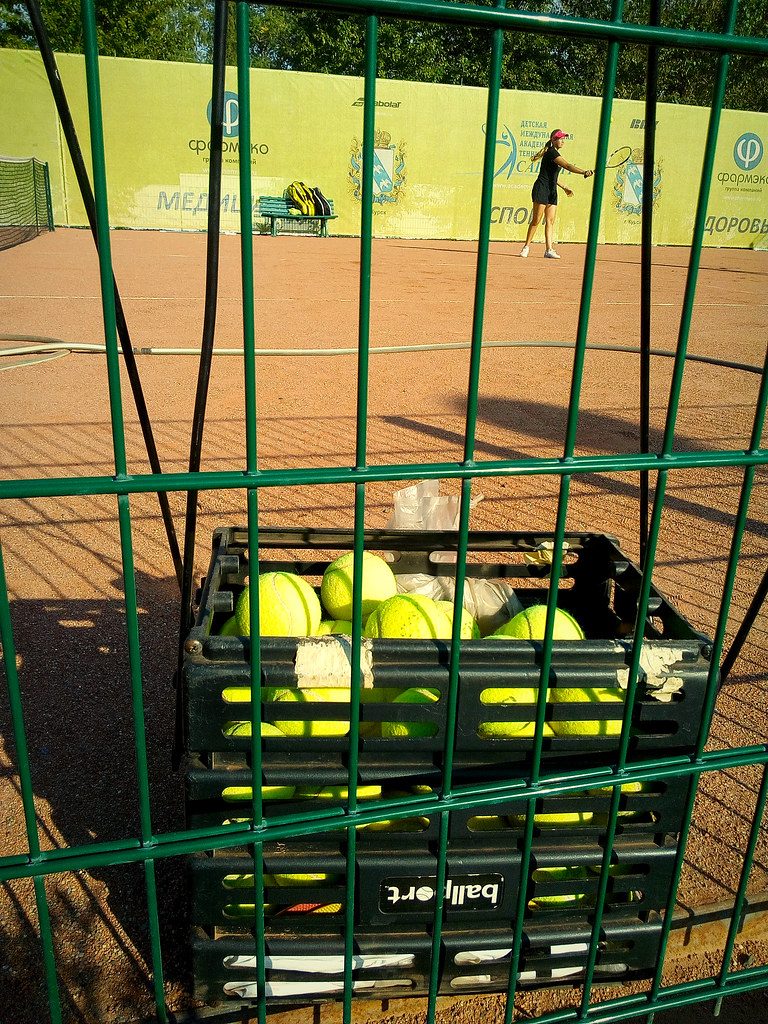 tennis balls, racket, tennis court, tennis player