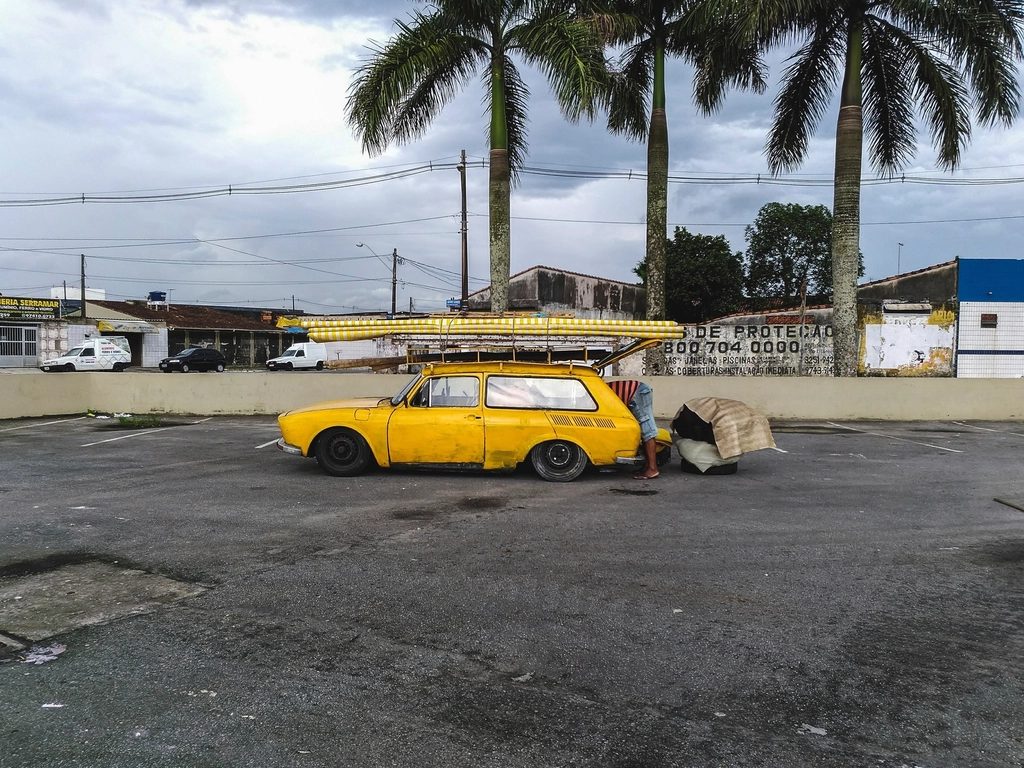 yellow car loaded ski rack