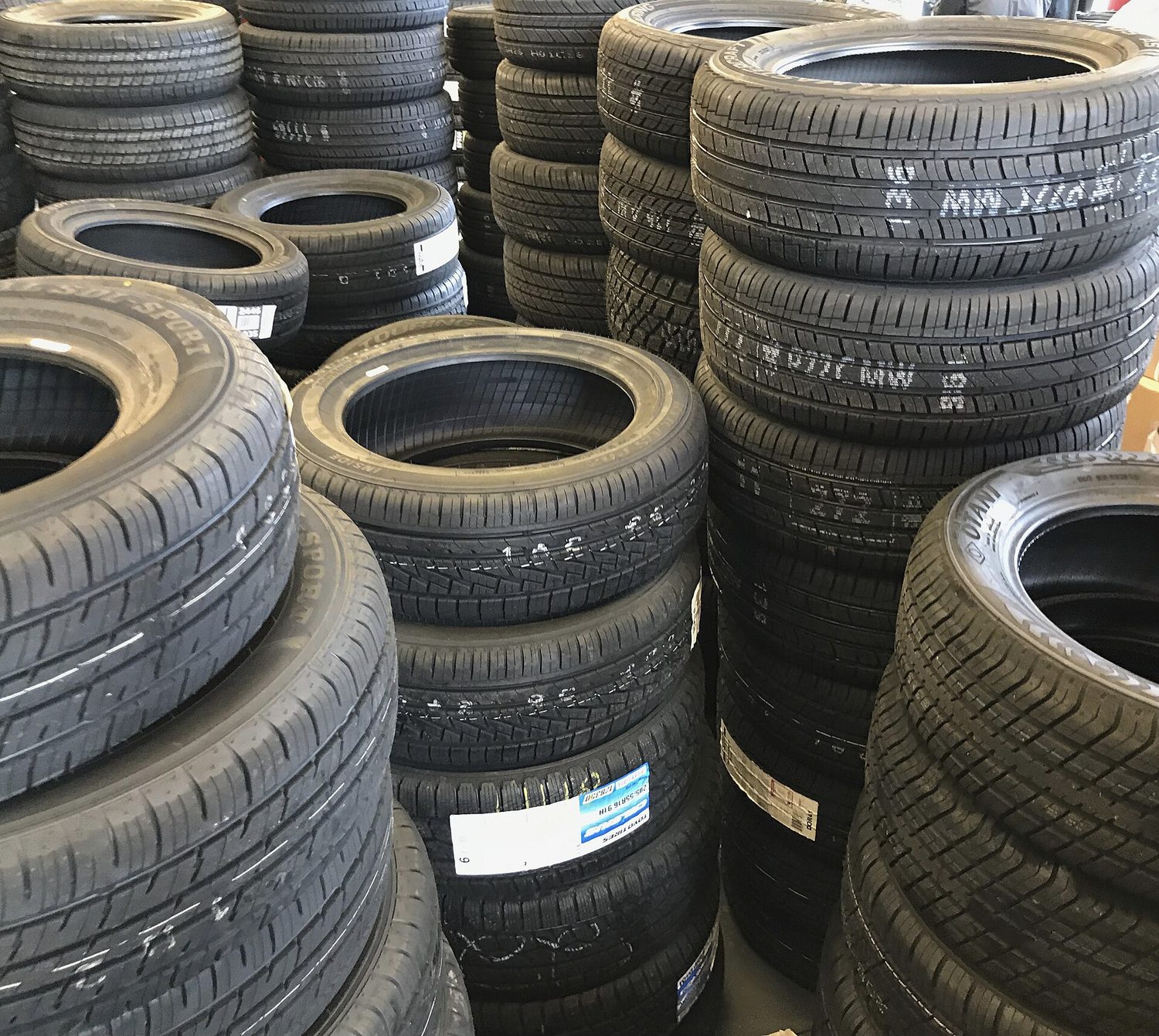 Assorted stacked automotive tires