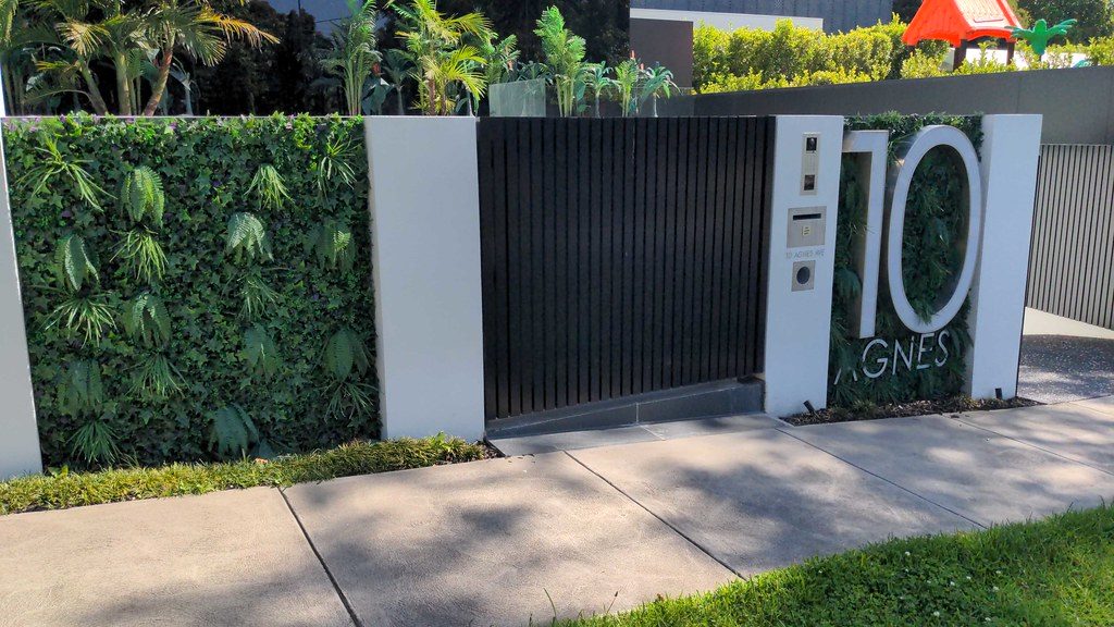 Artificial plants on front fence of 10 Agnes Avenue in Greythorn, North Balwyn
