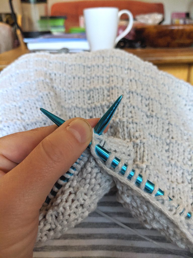 The bonus of knitting a baby blanket is that it keeps you warm