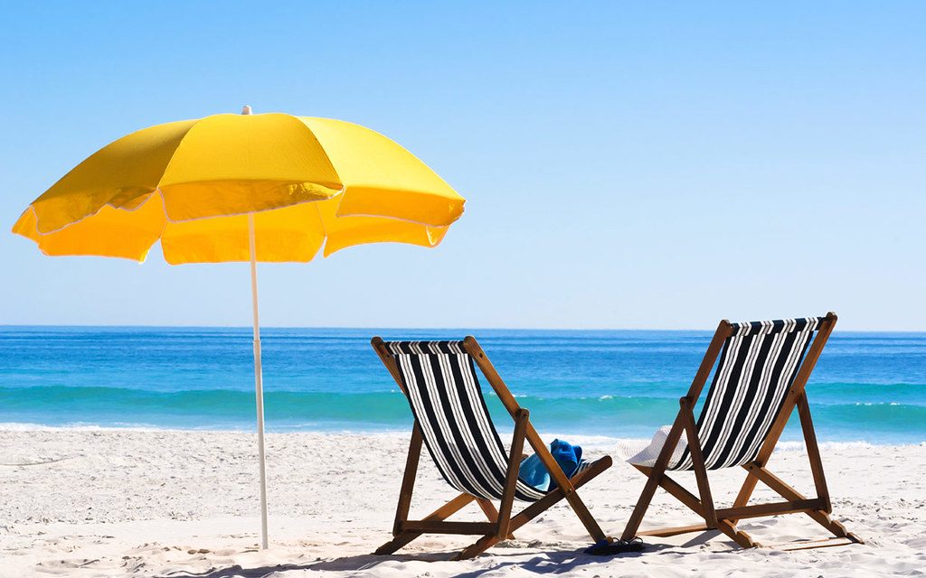Beach chairs on sand
