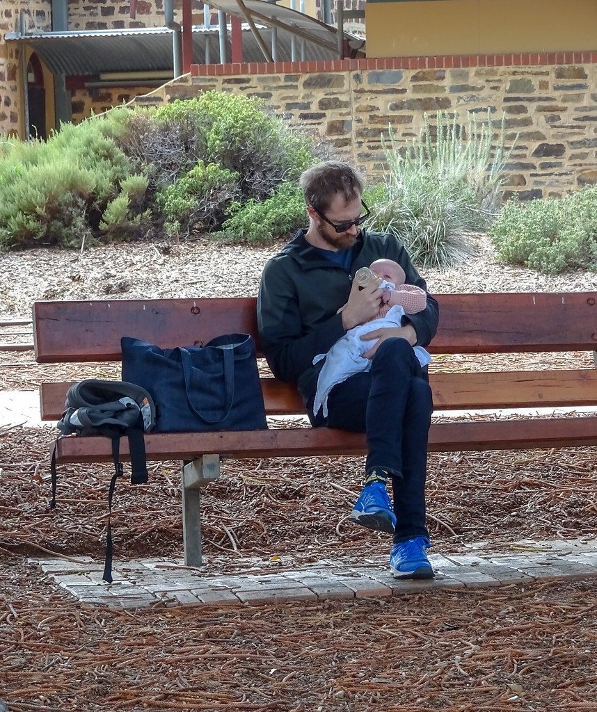 Dad Feeding the Baby