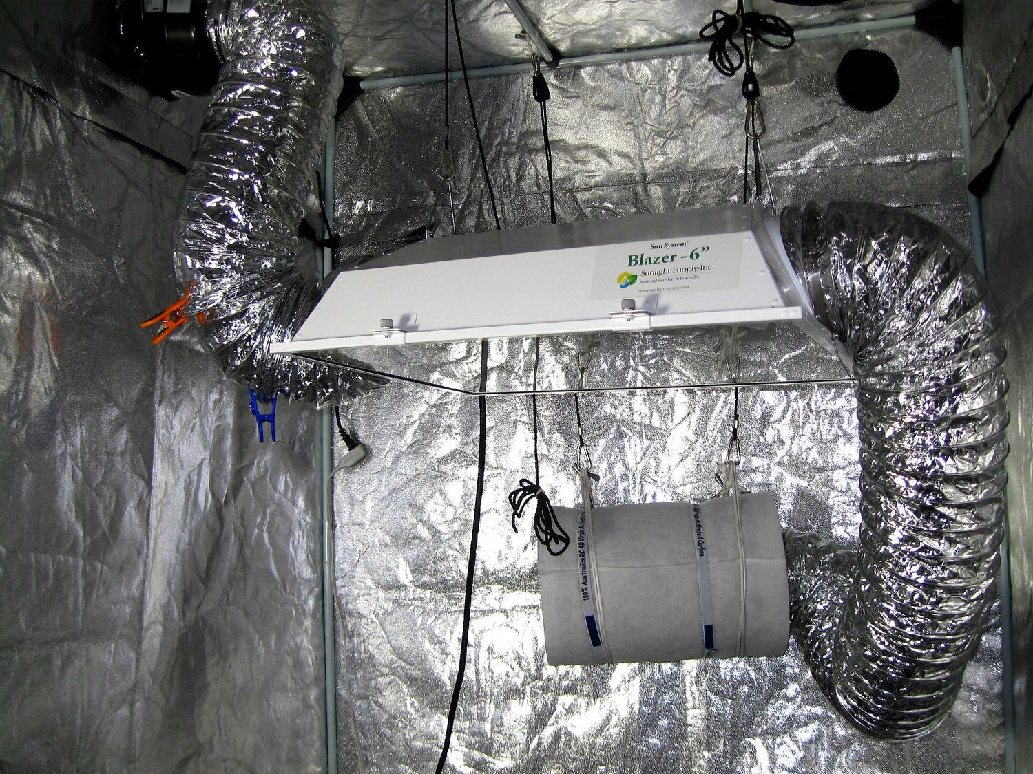 An HPS grow light in grow tent, with carbon filter and exhaust system