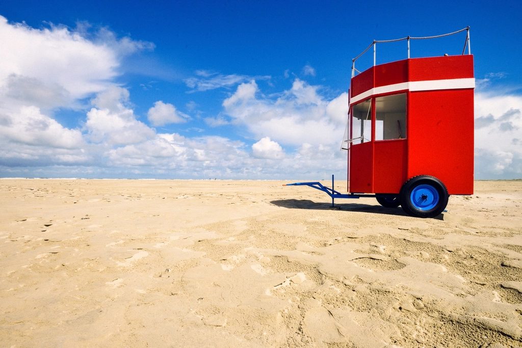 Red kiosk wheel beach