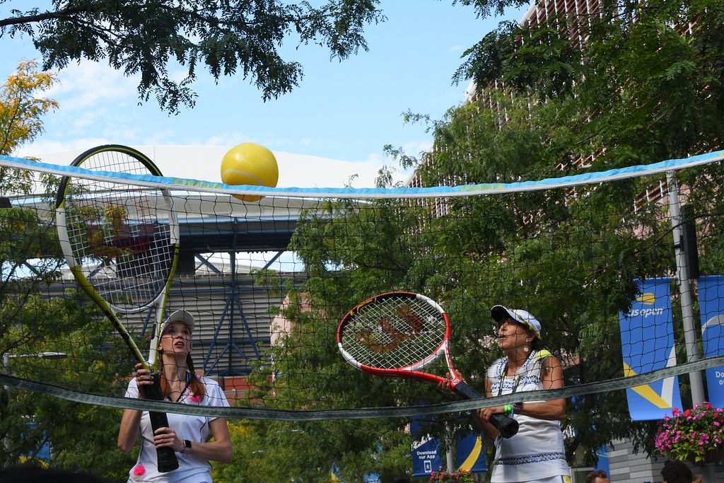 Women with Oversized Tennis Rackets 1