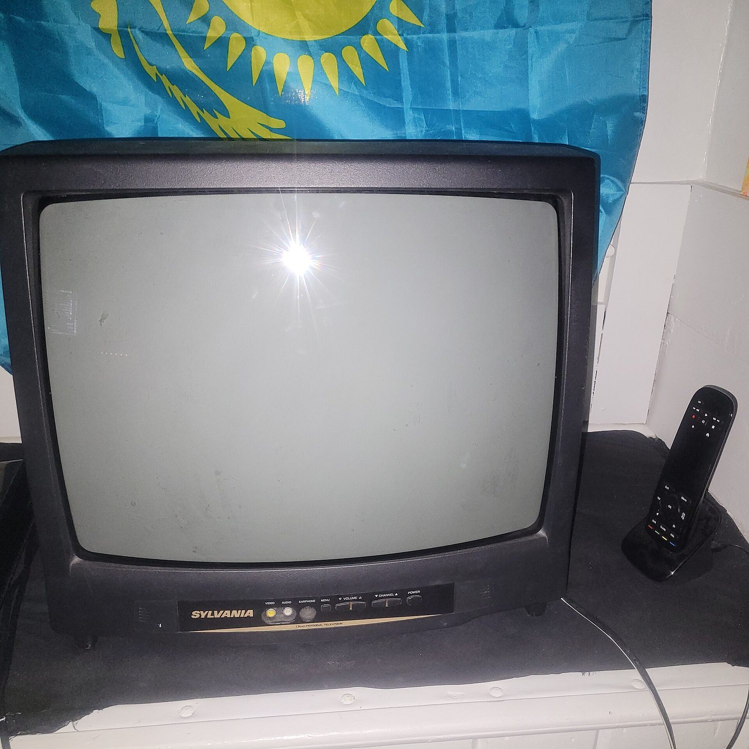 19" Sylvania CRT television with Logitech Harmony remote