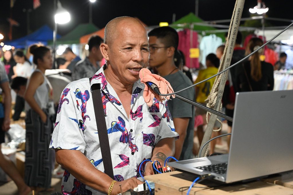 DSC_5675: a man standing in front of a laptop computer