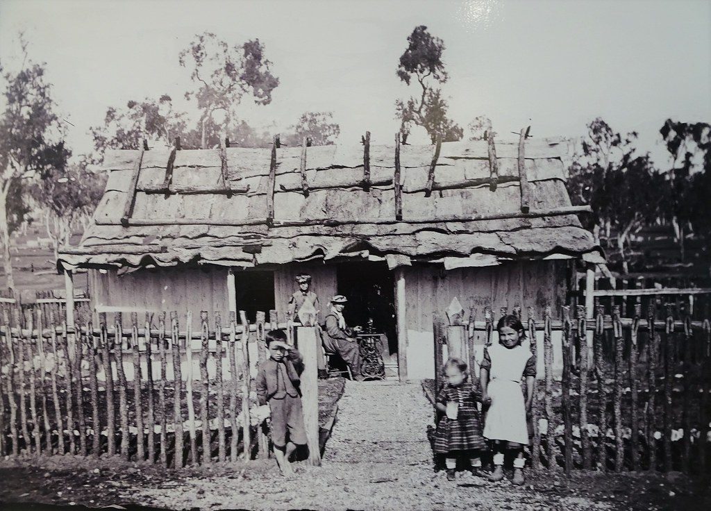 Gulgong. Henry Beaufoy Merlin and Charles Bayliss photographed Gulgong gold rush in 1872. 500 glass plate negatives are now the Holtermann Collection Museum. UNESCO heritage listed. Bark slab hut and sewing machine.