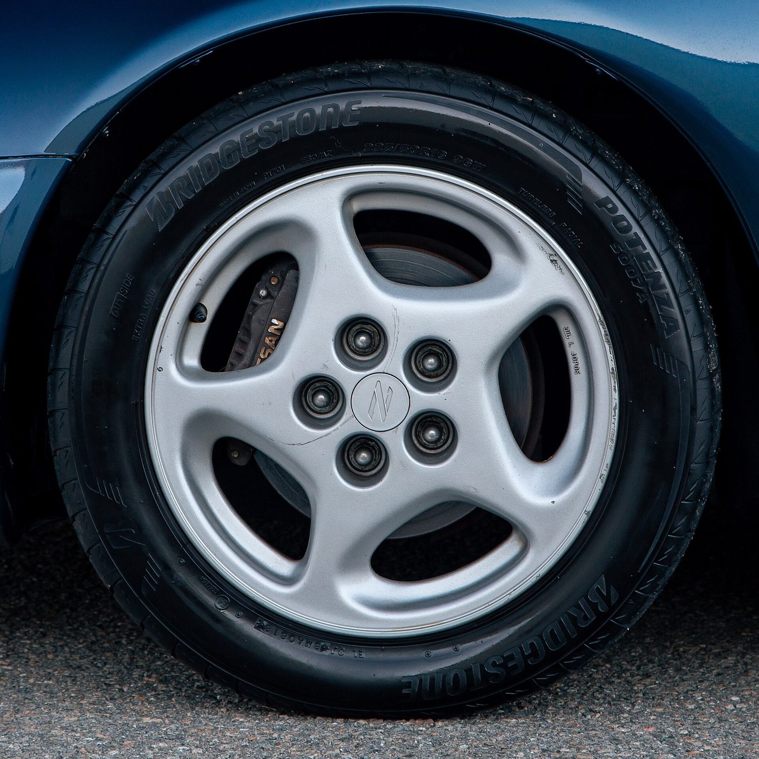 Bridgestone Potenza Tire on Nissan Z Wheel (50907114122)