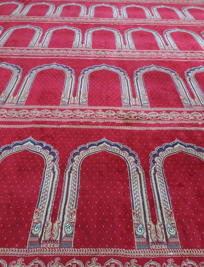 Adelaide. Park Holm. Interior of the Masjid Omar Bin Alkhattab Mosque. Wall to wall carpet from the Middle East with individual prayer mats pattern on it. t..