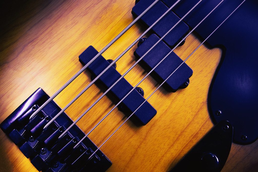Bridge and Pickups of Five Strings Bass Guitar