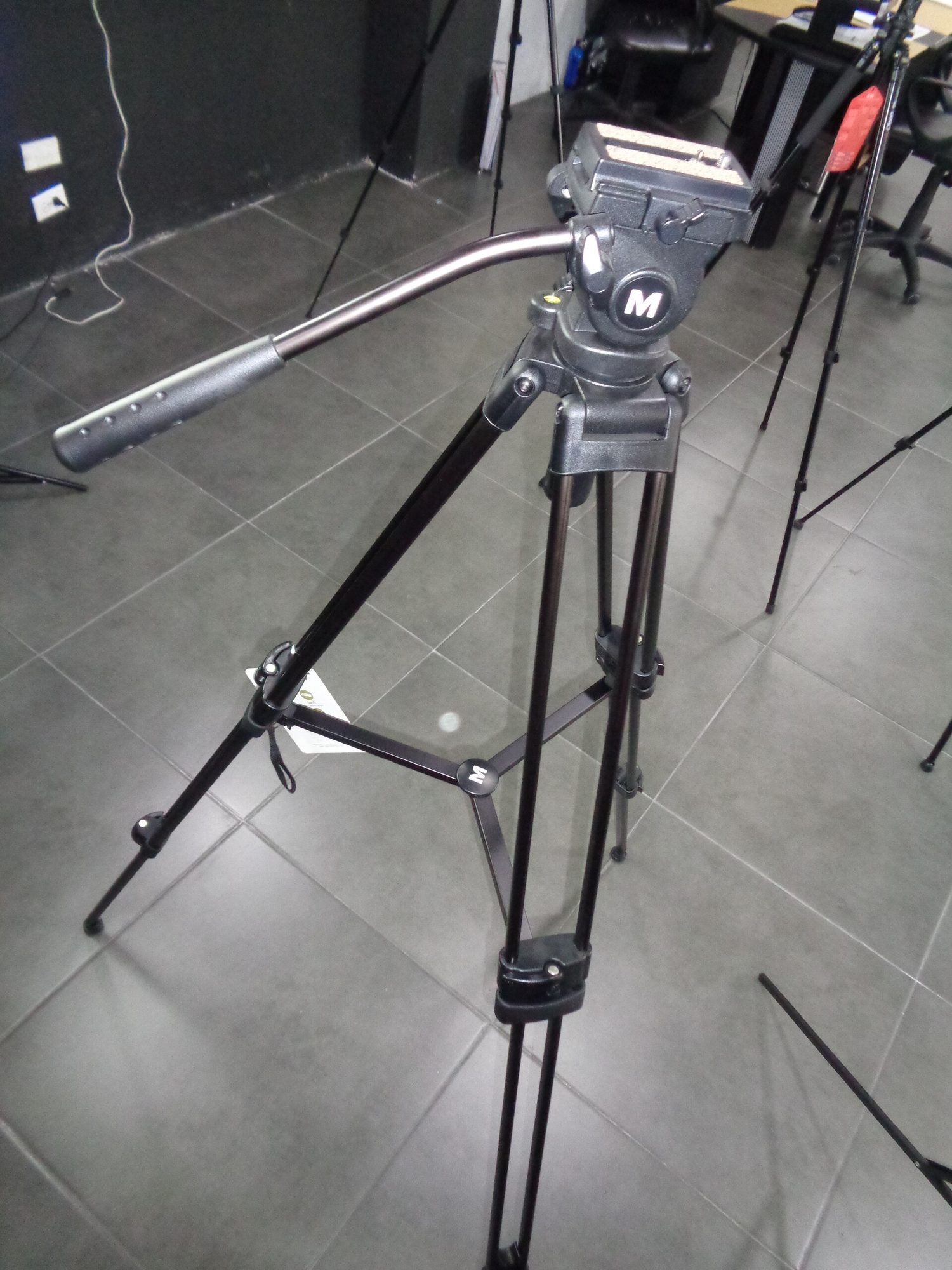 (Photography equipment Tripod Photo Camera Tripod photograph in a studio)